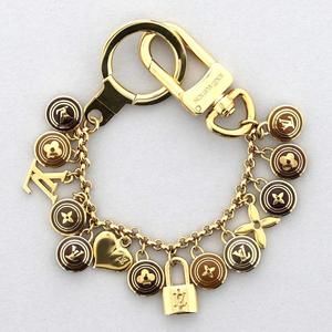 Louis Vuitton Porto Claire Sheen Pastille Key Ring Holder Gold
